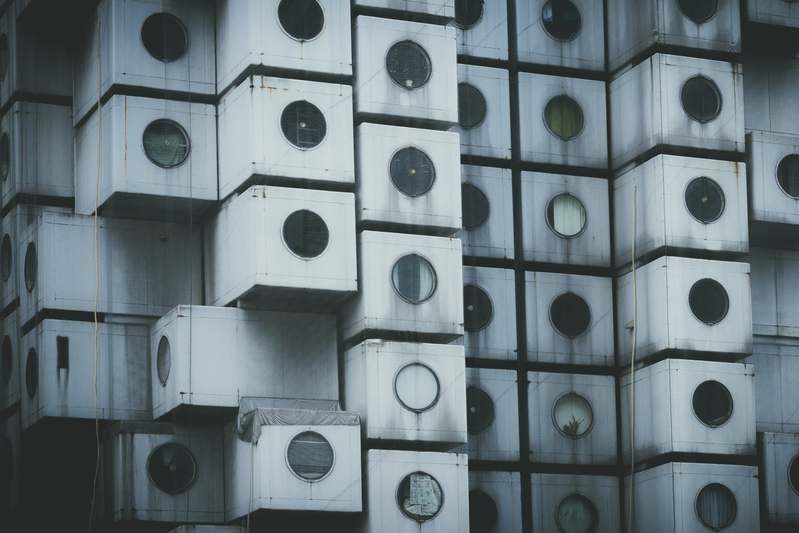 Close-up of interlocking vinyl modular tiles in a sunlit living room